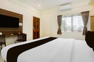 Super Hotel O PANVITH SUITES near Bangalore International Airport - 1