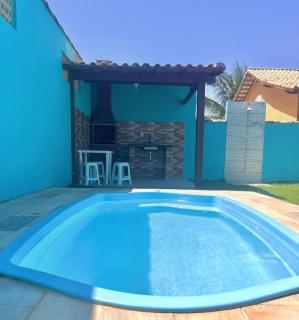 Casa a 50 metros da praia com piscina, churrasqueira e ar condicionado - 0