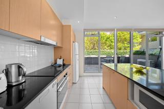 Spacious Apartment with Gym & Pool Access - 1