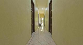 OYO 90596 Casaria Inn - 4