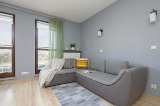 Grey Apartment in Warsaw with City View and Balcony by Noclegi Renters - 0