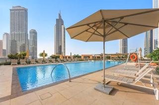 Vogue Vacation Homes, Downtown Burj Crown near Burj Khalifa and Dubai Mall, Three Bedroom plus Kids Room Apartment with Large Balcony and Skyline view, Access to all Amenities - 8