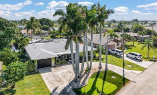 Waterfront Caribbean-Vibe Paradise with Heated Pool and Boat Dock - 0