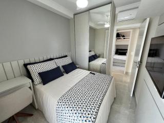 Home 48 I Apto pé na areia e com Piscina Aquecida em Bertioga - 9