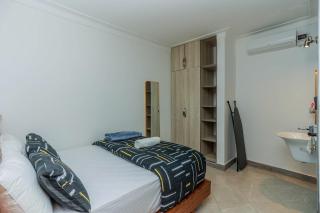 Cozy 1BR Stay Near Bahai Temple - WIFI, AC, SMART TV - 8