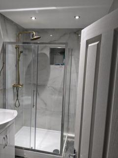 Private guest suite inside a family home with own entrance, kitchen, and bathroom - 4