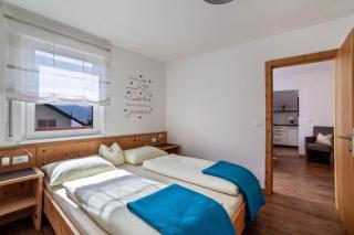 Schnitzer Ferienwohnung Enzian - 9