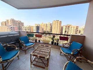 Bright 3BR Nasr City Stay Balcony and BBQ - 9