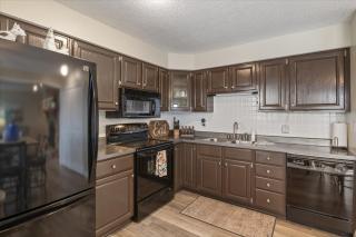 Lakefront Osage Beach Condo + Workspace w/ Pool Views - 1