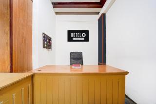 Super Hotel O Pathanamthitta Near Mahatma Gandhi Statue - 8