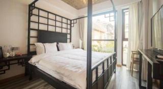 Dali Four Seasons Hostel - 9