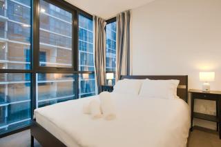 City View 2BR Apt with Pool Gym Steam & Sauna - 9