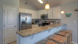 Bright Coastal Escape w Games Swing Chairs Minutes to Port A Beach Captain Kirk by AvantStay - 2