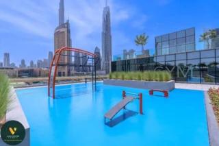 Vogue Vacation Homes, Downtown Views II with Easy Access to Dubai Mall Via a Climate Controlled Bridge, One Bedroom Apartment with Balcony and City View - 5