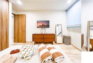 Modern 1BR Apartment with Resort-Style Amenities - 2