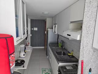 Cond Palm Village 107-04 em Muro Alto - 1