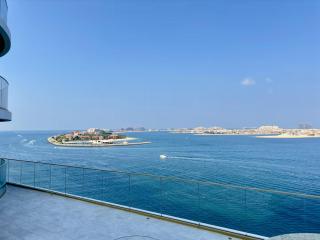 Vogue Vacation Homes, Emaar Beachfront Grand Bleu Designed by Elie Saab, near JBR and Palm Jumeirah, Two Bedroom Apartment with Balcony and Private Beach, Access to all Amenities - 3