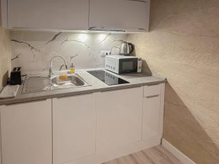 S8 Downtown Apartments with Optional Garage - 1