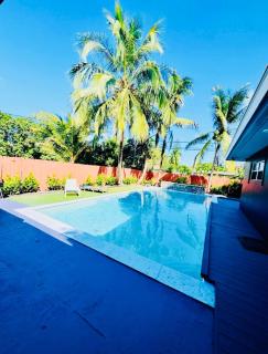 Modern Boho 3BR Duplex Escape with Pool & King Bed Near Beach - 9