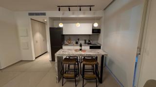 בראון 42 סוויטת גן 2 חדרים עם גקוזי מפנק במרפסת - 4