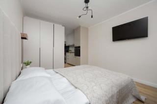 A Unique Studio with a Beautiful View of the Palace of Culture and Science by Noclegi Renters - 5