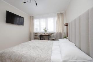 A Unique Studio with a Beautiful View of the Palace of Culture and Science by Noclegi Renters - 2