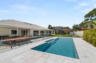 Luxe 4BR Retreat with Heated Pool & Finnish Sauna, Steps to the Beach - 9