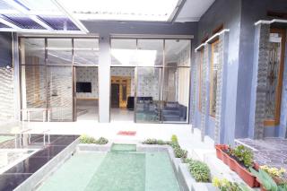 Hotel O 94911 Syariah Anggrek Guest House - 9