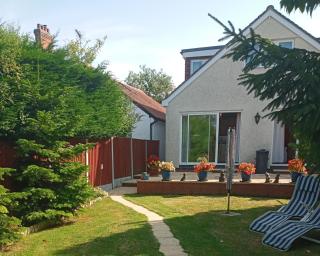 Central to town, 4 bedrooms, sleeps 7, parking for 4 plus cars - 0