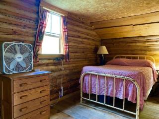 Waterfront Vacation Rental with Charming Wooden Interior near Mount Katahdin, Maine - 1