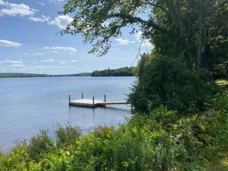 Waterfront Vacation Rental with Charming Wooden Interior near Mount Katahdin, Maine - 3