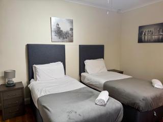 Stylish 4-Bedroom Home with Modern Comforts - 2