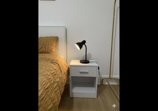 Cozy Minimalist bedroom with king sized bed - 8