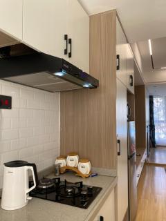 Cozy studio with a well equiped gym , heated pool and a 24hour generator - 6