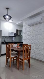 Apartamento na Praia das Toninhas em Ubatuba 350m da praia -2 quartos sendo 1 suite, piscina, varanda gourmet com churrasqueira, ar condicionado, cozinha completa, duas garagens - 6