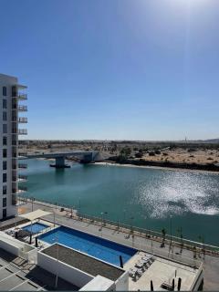 85 inch TV & Boho style apartment in Yas Island - 9