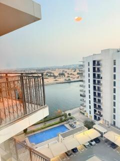 85 inch TV & Boho style apartment in Yas Island - 5