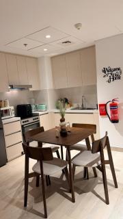 85 inch TV & Boho style apartment in Yas Island - 4