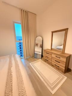 85 inch TV & Boho style apartment in Yas Island - 2