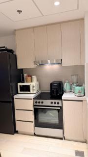 85 inch TV & Boho style apartment in Yas Island - 1