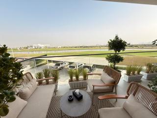 Golf view living by FlamingoAmber Dubai - 6