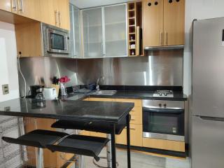 Cozy 2BR Retreat in Las Condes Prime Location - 3