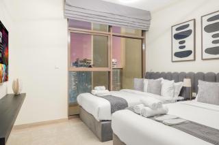 Cozy 2BR with Canal View & Partial Burj View - 1