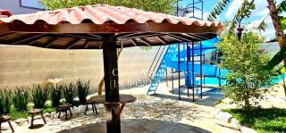 Fantástica Casa a Beira Mar com Piscina Aquecida Cobrado a Parte, Toboágua, Cascata, Hidromassagem, Salão de Jogos com Bilhar e Pebolim, Área Gourmet Coberta com Quiosque e Churrasqueira, 6 Quartos Sendo 4 Suites, 7 Banheiros, Garagem para 6 Carros, Wi-Fi - 6