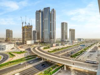 Stylish 1BR Near Burj Khalifa with Rooftop Pool, City Views, Free Parking - 9