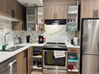 Walkout basement suite with canal view near airport - 8