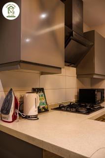 Aurea by Khaneh-ye-Del Stylish 1BHK at Bahria Heights 1 with Gym - 4