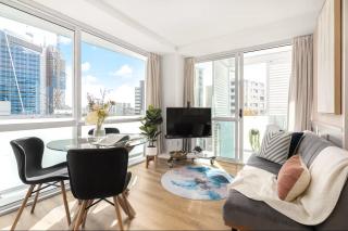 Stylish 2BR City Retreat - Air-Con & Balcony - 9