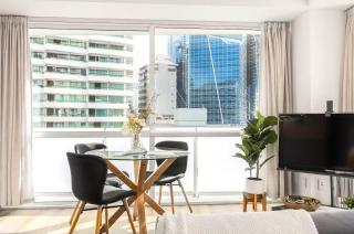 Stylish 2BR City Retreat - Air-Con & Balcony - 2