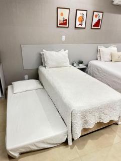 Flat aconchegante - Perto de Tudo - Vista Livre - Estacionamento privativo e Portaria 24h - Wi-Fi 600mbps - 1